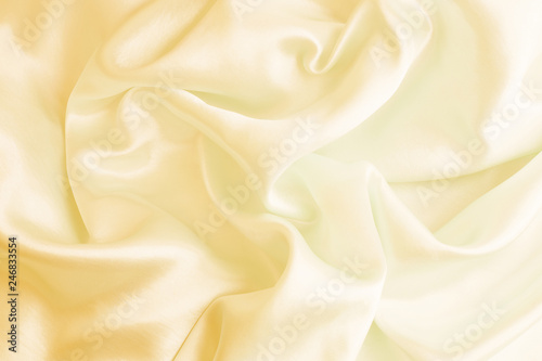 beautiful cream silk texture luxurious satin for abstract background. soft focus