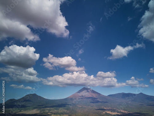 Cloudscape with volcano on background