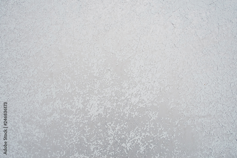 Gray peeling paint on old wall for background or texture. Gray peeling paint on old wall for background or texture.