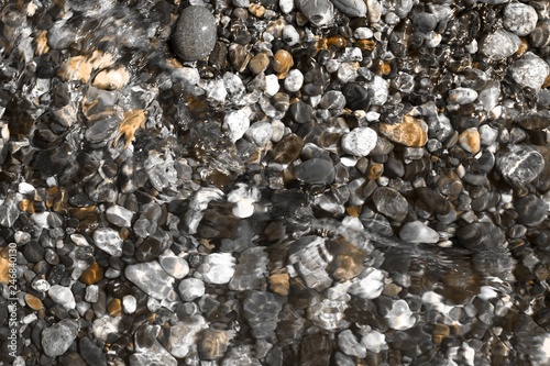 Wallpaper Mural orange sparkling river rocks wet by water texture - cute abstract photo background Torontodigital.ca