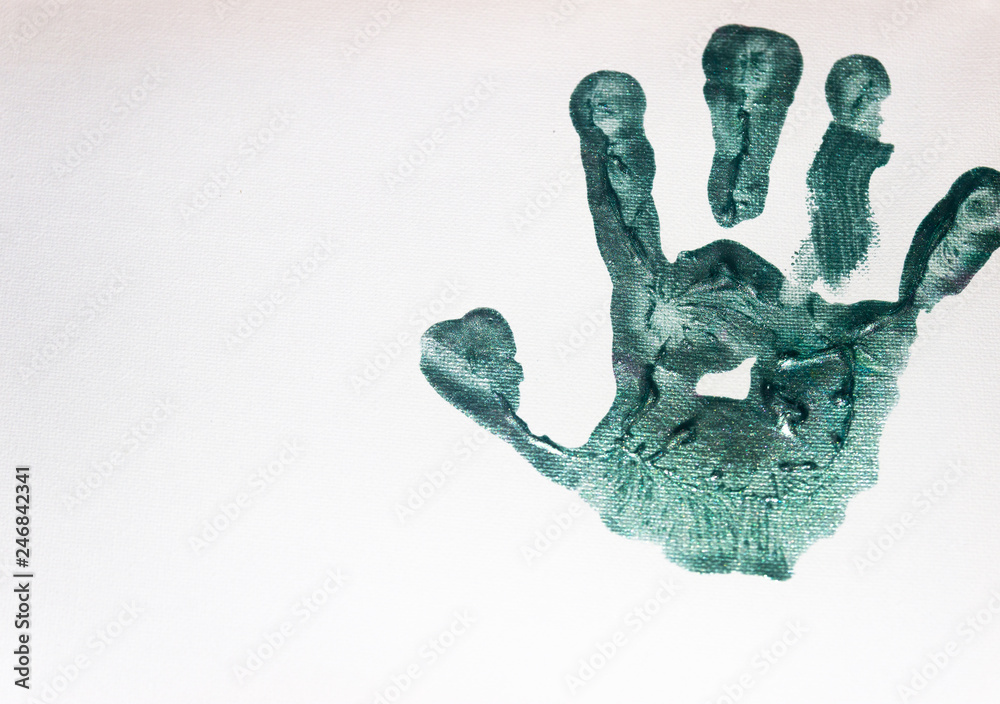 Green Paint on children's hands. Green Paint on children's hands.