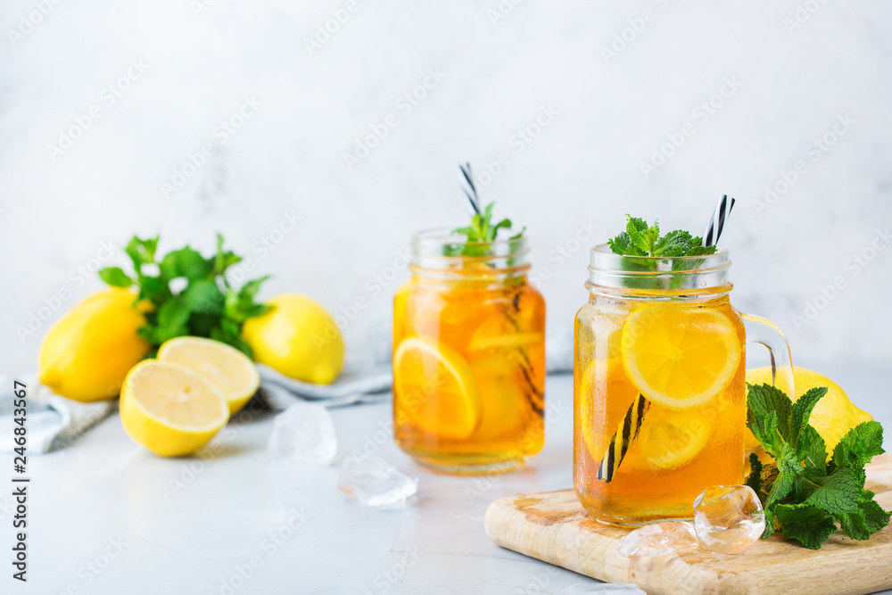 Lemon mint iced tea cocktail refreshing drink for summer days Lemon mint iced tea cocktail refreshing drink for summer days