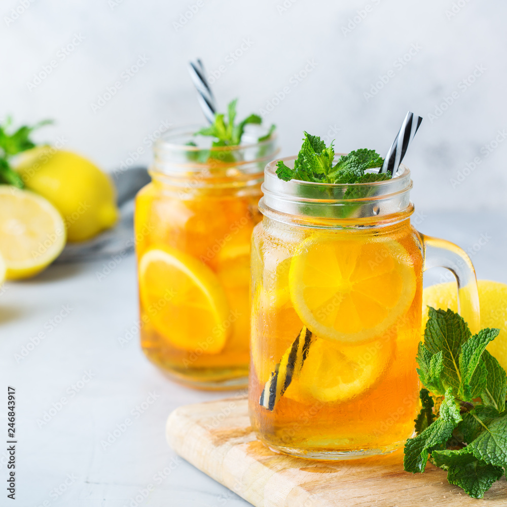 Lemon mint iced tea cocktail refreshing drink for summer days Lemon mint iced tea cocktail refreshing drink for summer days