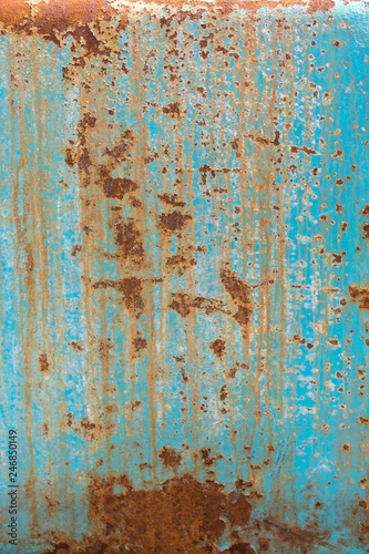 Rusty Metal Background Texture. Rusted, old, vintage, retro background texture on blue metal, steel or iron plate surface. Industrial obsolete concept image