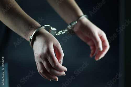 women handcuffed in criminal concept  © appledesign