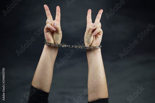 women handcuffed in criminal concept 