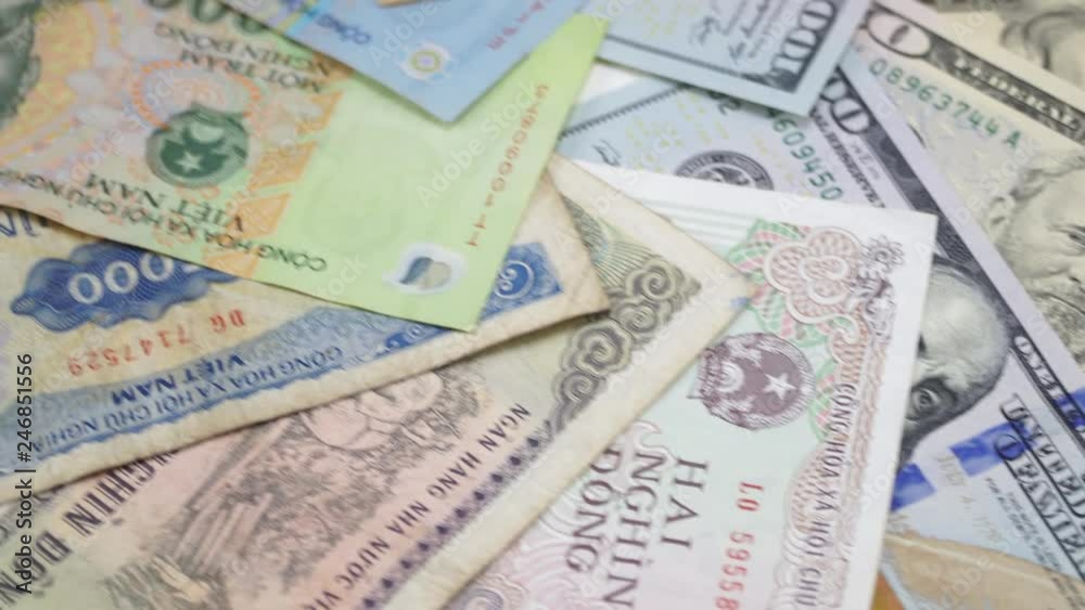Old and new Vietnamese money and US dollars. 4K Old and new Vietnamese money and US dollars. 4K