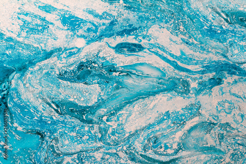 Blur marbling blue texture. Creative background with abstract oil painted waves handmade surface. Liquid paint.