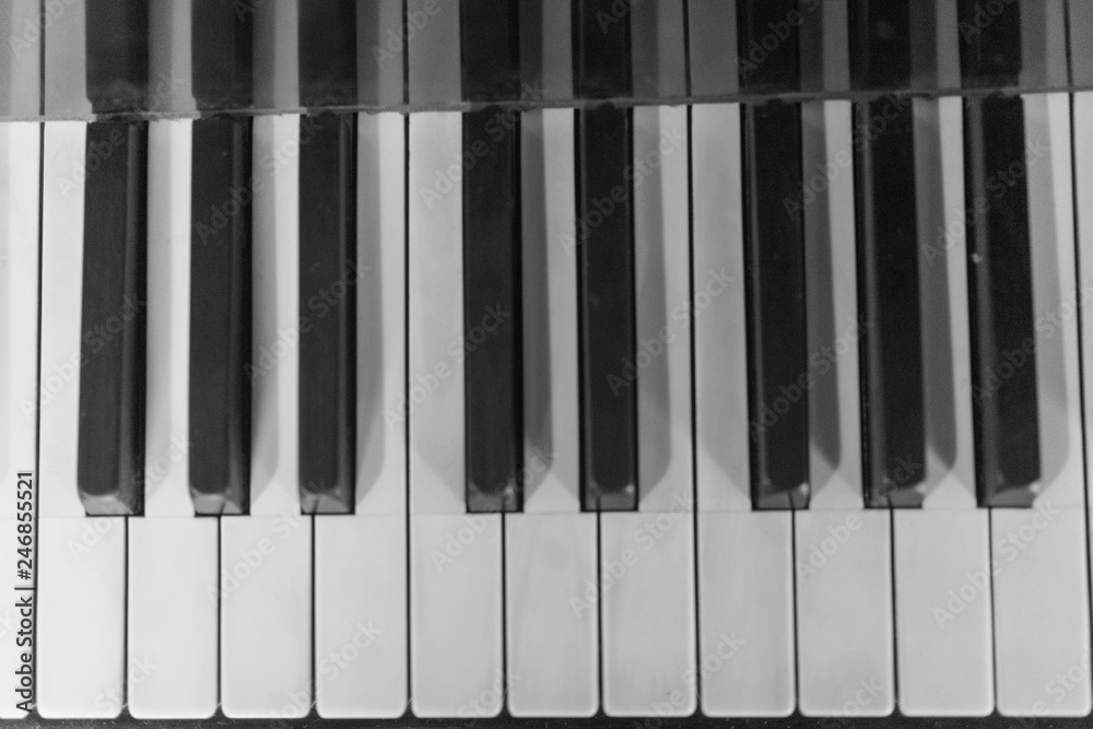 Fototapeta premium piano keys on black background
