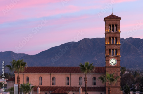 North view of the Saint Andrew church in the foreground and the San Gabriel Mountains in the backgrounds. This church is considered among the most beautiful in Southern California. photo