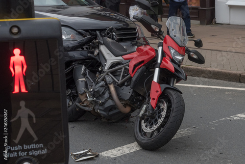 Wallpaper Mural dramatic collision between motorcycle and car at zebra crossing Torontodigital.ca