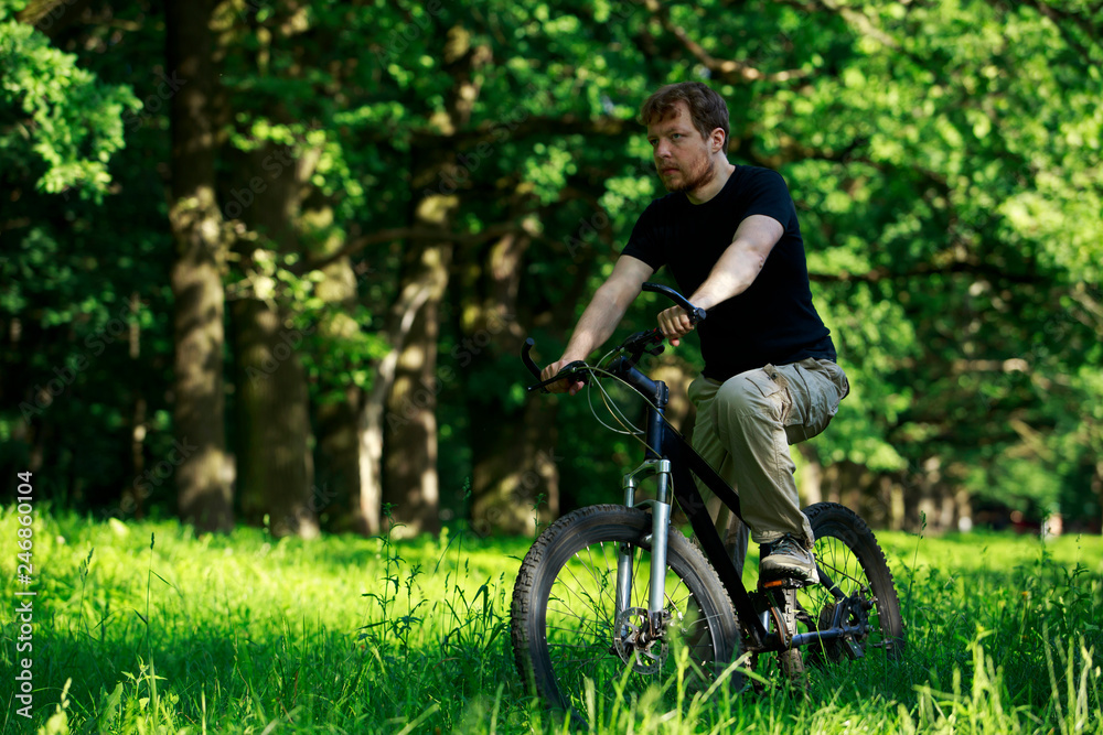 Naklejka premium Young guy on bike