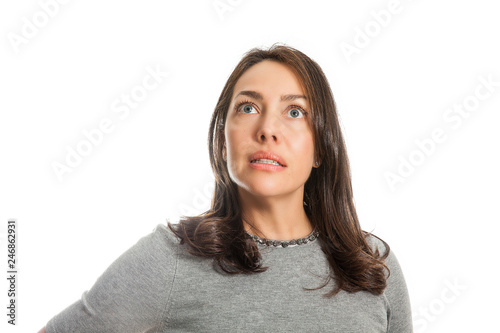 Young caucasian woman with fear, shock or surprise expression isolated on white background © anamejia18