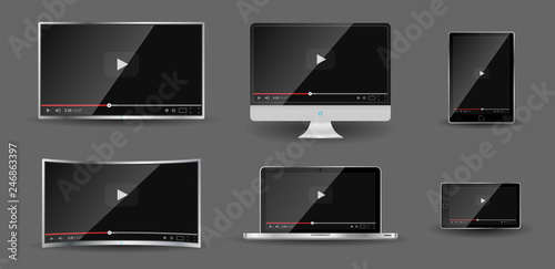 Realistic modern digital devices isolated on grey background. PC, TV, smartphone, laptop, tablet. Classic video player template on screen. Online video watching conecpt. Vector illustration