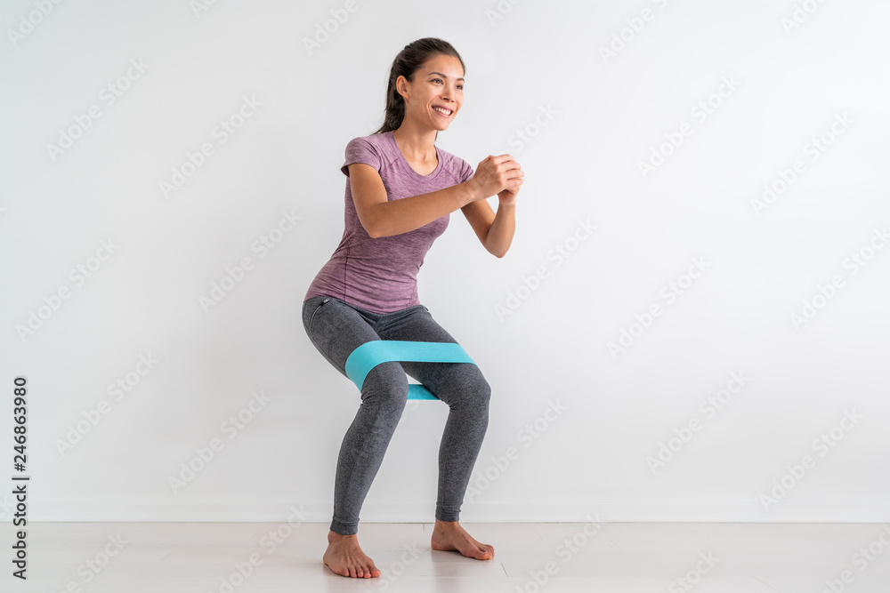 Resistance band exercises with fabric elastic equipment. Crab walk squat  exercise fit Asian fitness woman training at home. foto de Stock | Adobe  Stock