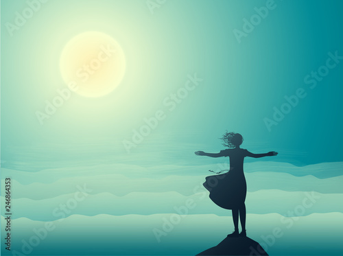 silhouette girl standing on the edge of the cliff an looking at the sun-rise and sea waves, sea landscape,
