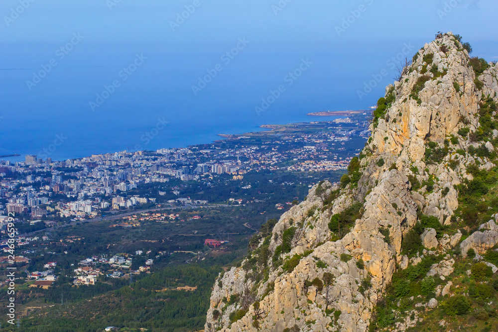 Naklejka premium the background is blurred, landscape, view of the village of kyrenia from the mountain, from the height of the castle of Saint Hilarion