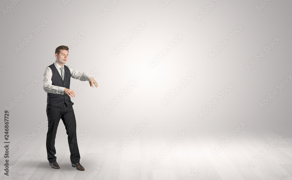 Zombi, sleepy maniac businessman walking in a copy space
Zombi, sleepy maniac businessman walking in a copy space
