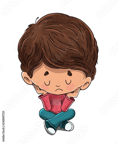 Niño triste sentado en el suelo photo