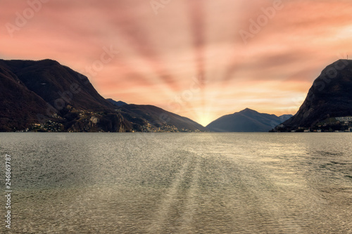 Red sunset on the lake of Lugano photo