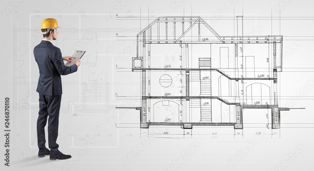 Architect watching a 2 dimension house plan
Architect watching a 2 dimension house plan