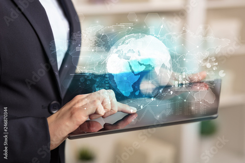 Wallpaper Mural Working business woman with global reports and stock market change concept
 Torontodigital.ca