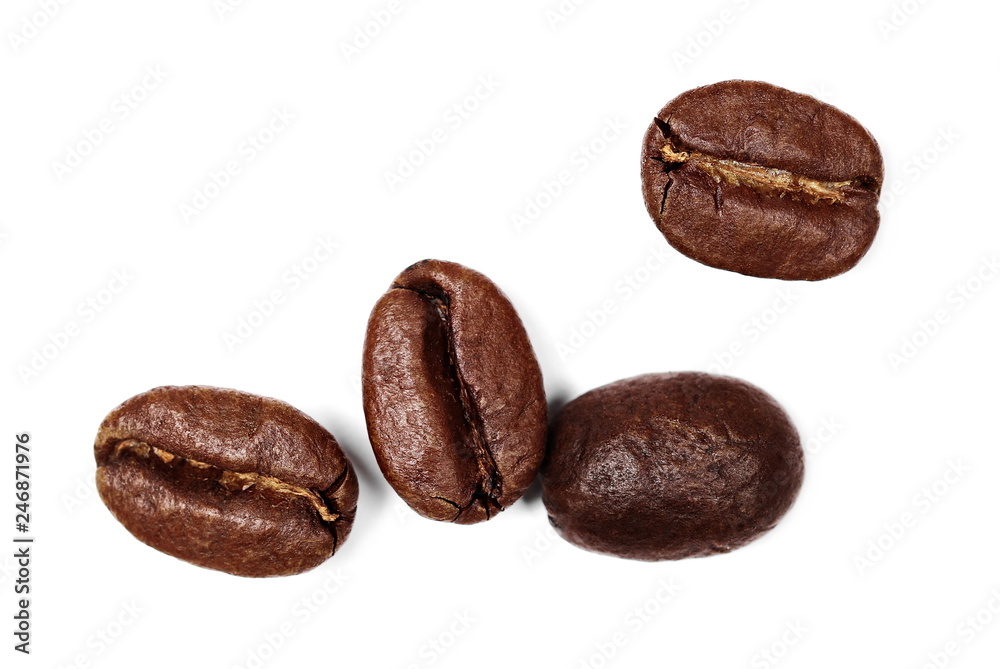 Coffee beans macro isolated on white, top view Coffee beans macro isolated on white, top view
