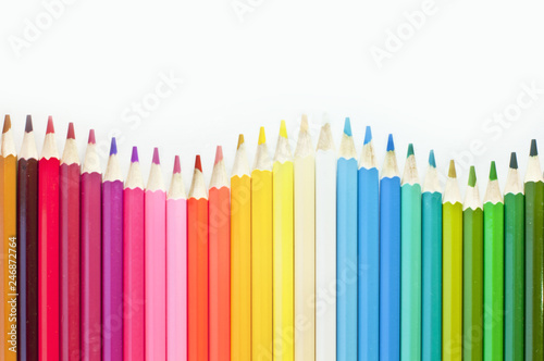 Colored pencils making a wave. With copyspace
