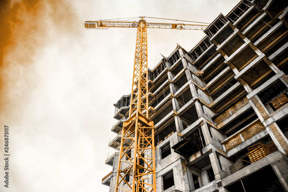 construction and yellow crane, toned image