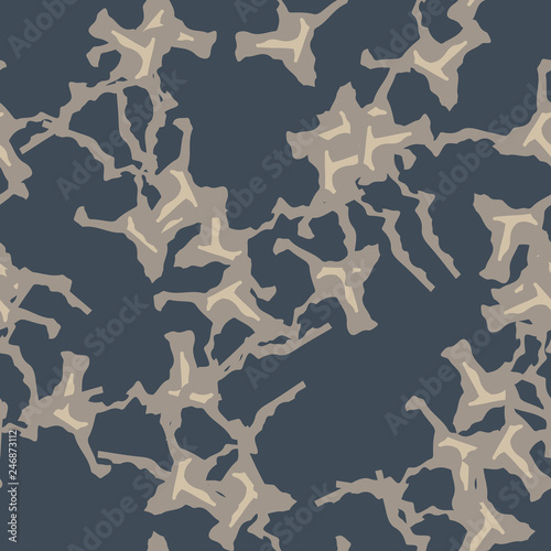 Urban camouflage of various shades of beige and blue colors