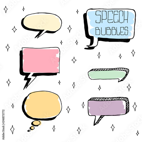 Set of Cute Hand Drawn Speech Bubbles in Doodle Style. Colorful on white sparks background.