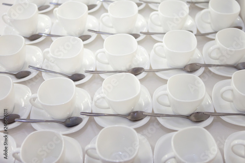 it is a lot of empty white net tea cups