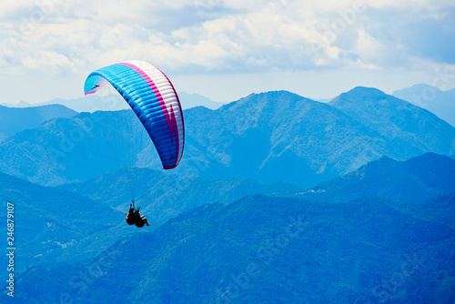 Paragliding over Lake Garda (Lago di Garda or Lago Benaco) from Monte Baldo mountain, Italy
