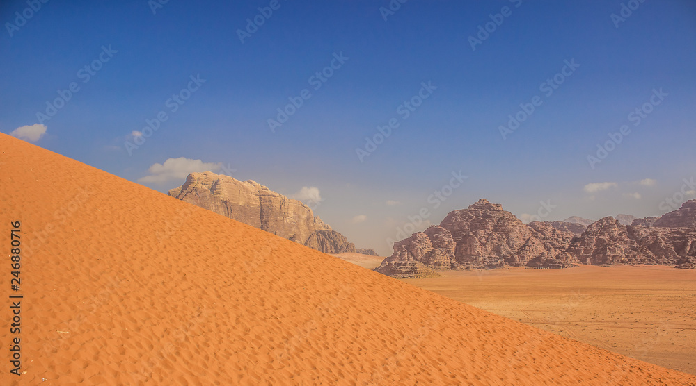vivid summer panorama scenery landscape of bright yellow and blue picturesque Middle East desert, world heritage touristic site concept vivid summer panorama scenery landscape of bright yellow and blue picturesque Middle East desert, world heritage touristic site concept
