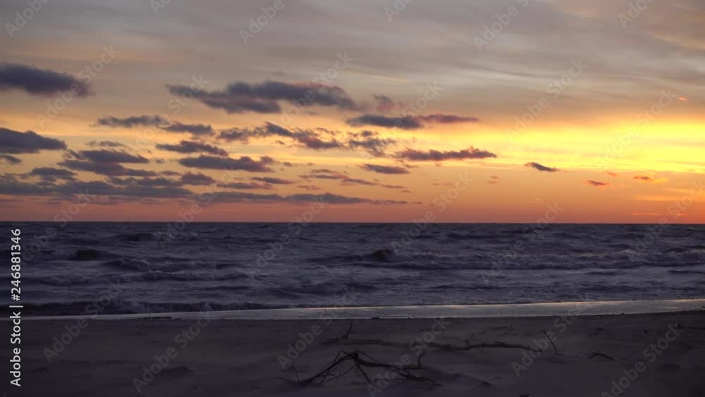 4K Waves Crashing Against Sand During Golden Purple Sunset At Dusk 4K Waves Crashing Against Sand During Golden Purple Sunset At Dusk
