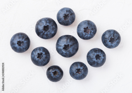 Fresh raw organic blueberries on white background. Macro close up