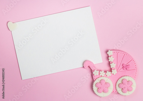 It's a girl pink card. Newborn background. Baby shower invitation. Birth announcement. Flat lay, text space