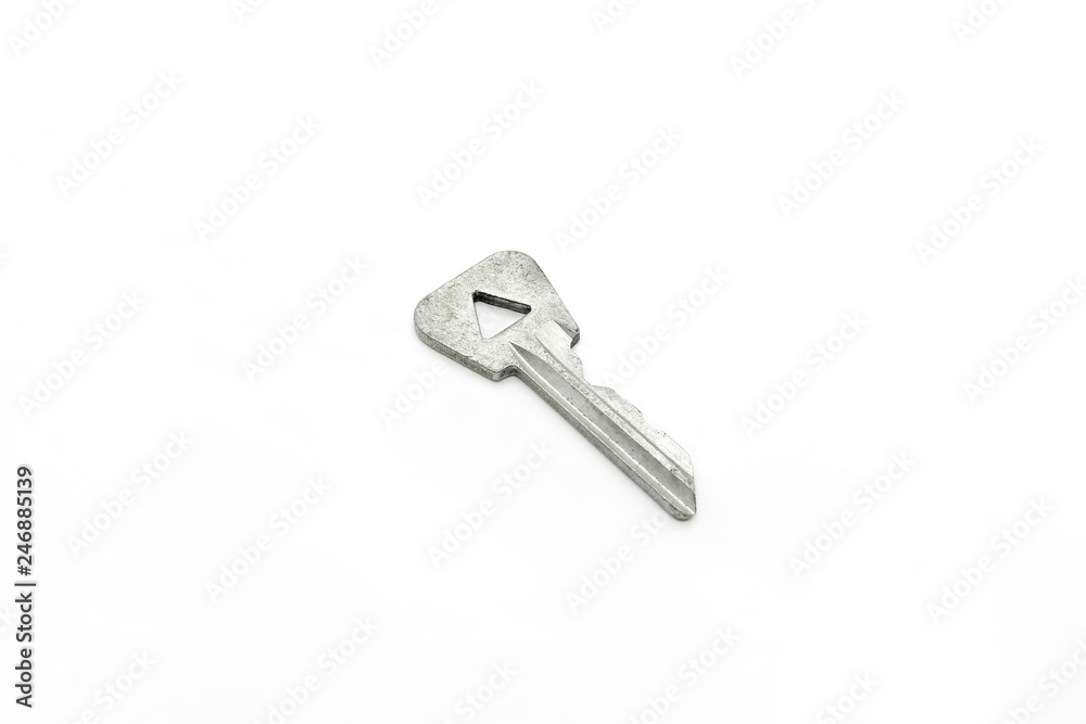 Old key with a triangular hole on white background Old key with a triangular hole on white background