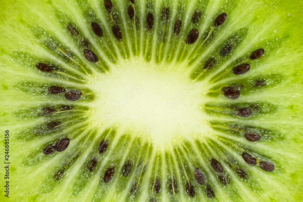 Fresh cut of a kiwi. Background, texture. Fresh cut of a kiwi. Background, texture.