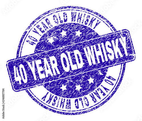 40 YEAR OLD WHISKY stamp seal imprint with distress texture. Designed with rounded rectangle and circles. Blue vector rubber print of 40 YEAR OLD WHISKY tag with scratched texture.