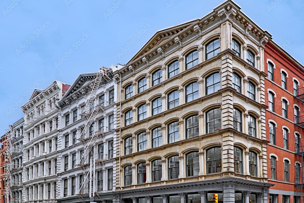 Historic cast iron buildings, used as loft apartments and shops, Broome Street in SoHo area of Manhattan