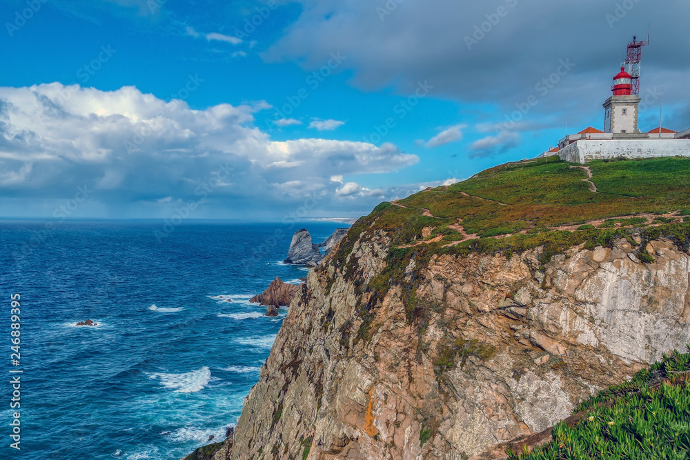 View of Lighthouse and cliffs over Atlantic Ocean in Cabo da Roca, Portugal