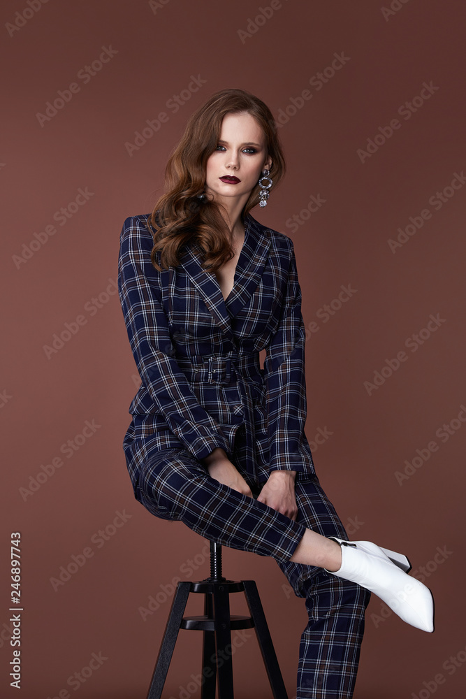 Beautiful sexy woman wear for meeting date business style suit jacket pants hand bag accessory fashion collection shoes model pose long brunette hair natural make up businesswoman casual clothes. Beautiful sexy woman wear for meeting date business style suit jacket pants hand bag accessory fashion collection shoes model pose long brunette hair natural make up businesswoman casual clothes.