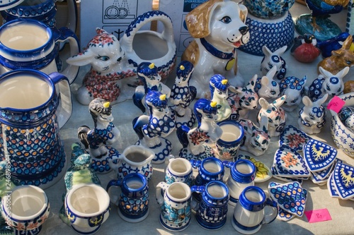 ceramic items exhibited at the local bazaar, sale of porcelain crafts, dishes and decorative figurines