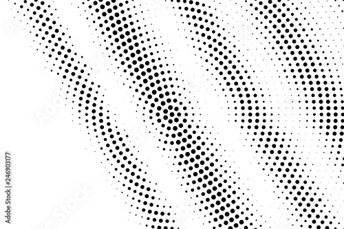 Black on white grungy halftone texture. Diagonal dotwork gradient. Distressed dotted vector background
