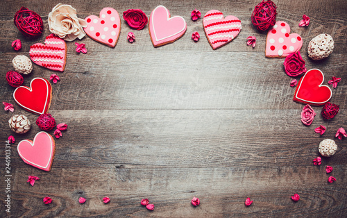 Heart shaped cookies on a rustic wood background for Saint Valentine's Day. Valentines Day background