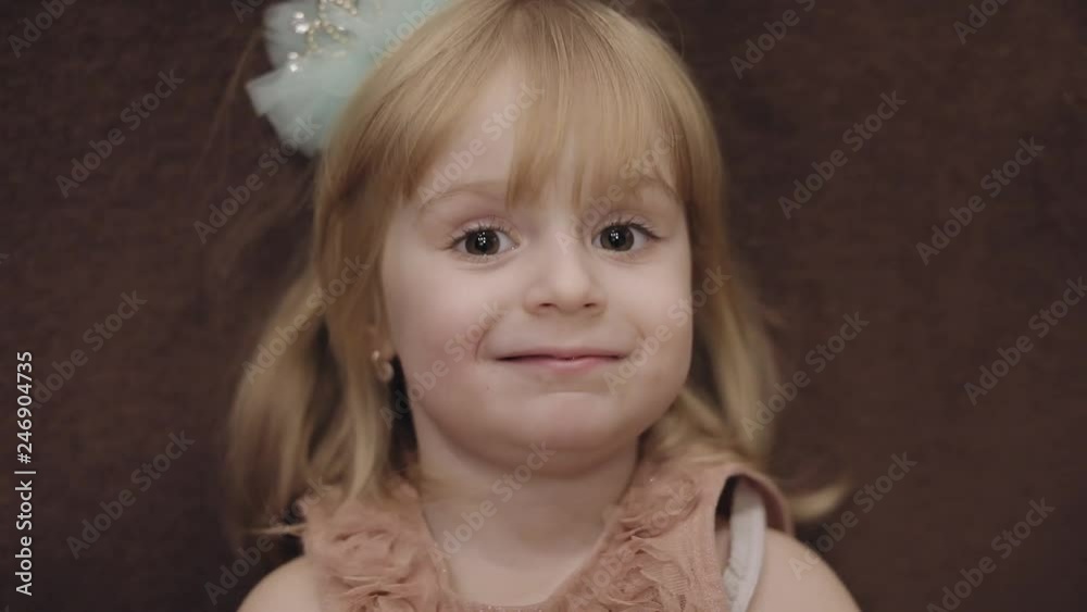 Happy three years old girl. Cute blonde child. Brown eyes. Cute girl smiling. Pretty little child, 3-4 year old blonde girl. Make faces Happy three years old girl. Cute blonde child. Brown eyes. Cute girl smiling. Pretty little child, 3-4 year old blonde girl. Make faces