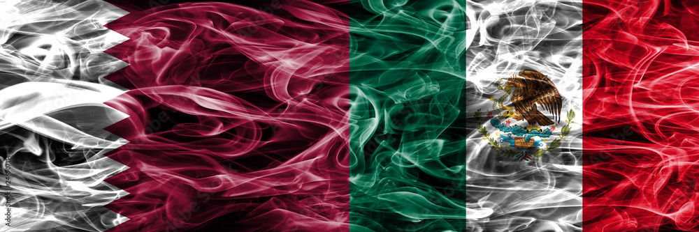 Obraz premium Qatar vs Mexico, Mexican smoke flags placed side by side. United Arab Emirates. UAE.