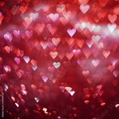 Bright red hearts abstract bokeh background