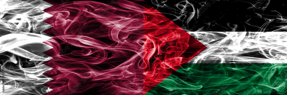 Fototapeta premium Qatar vs Palestine, Palestinian smoke flags placed side by side. United Arab Emirates. UAE.